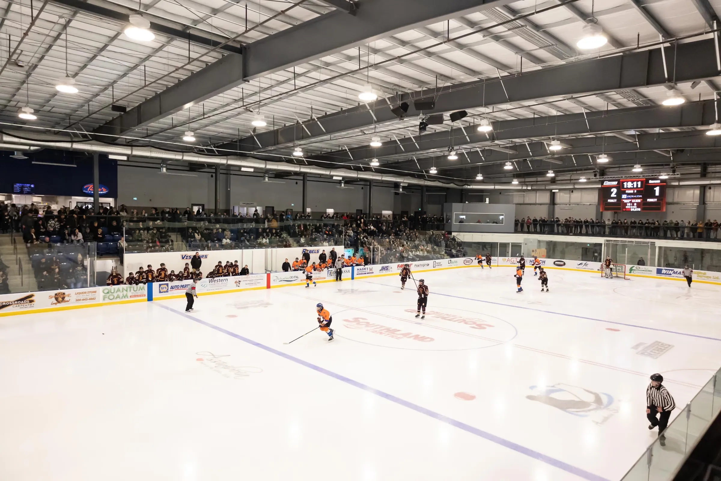 Hockey night at the Southland Co-op Centre in Assiniboia — packed stands watching the game