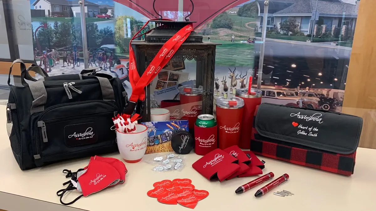 Town of Assiniboia merchandise display — red and black Heart of the Golden South gear